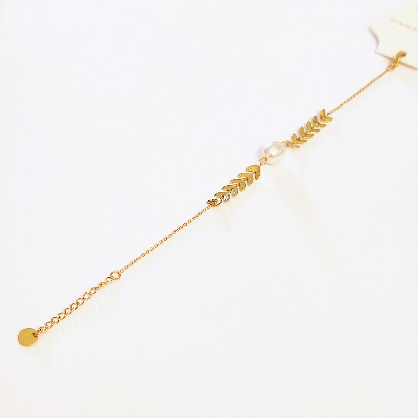 Collier chaine plume et perle