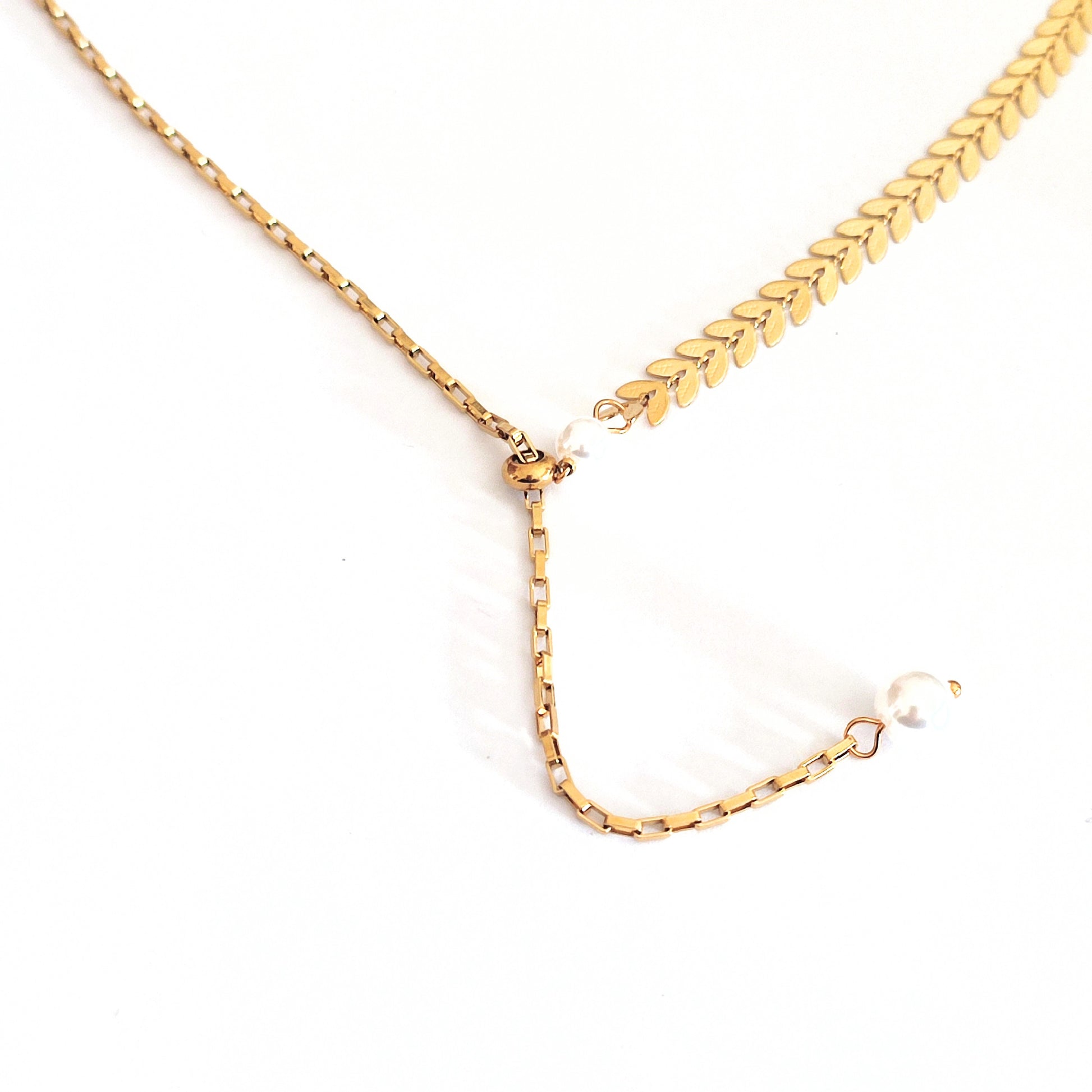 Collier y chaîne et perles 