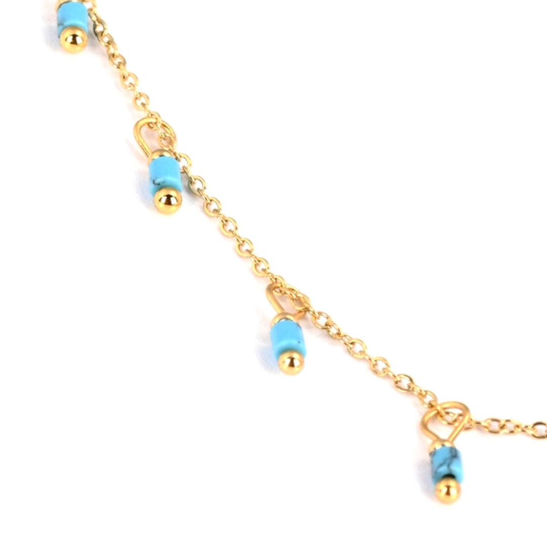 Collier avec petits pendentifs bleus